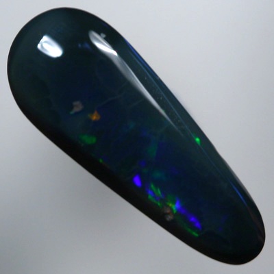 SOLID BLACK OPAL Red flashes together with green and blue